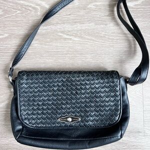 Elliott Lucca black lattice leather shoulder bag.